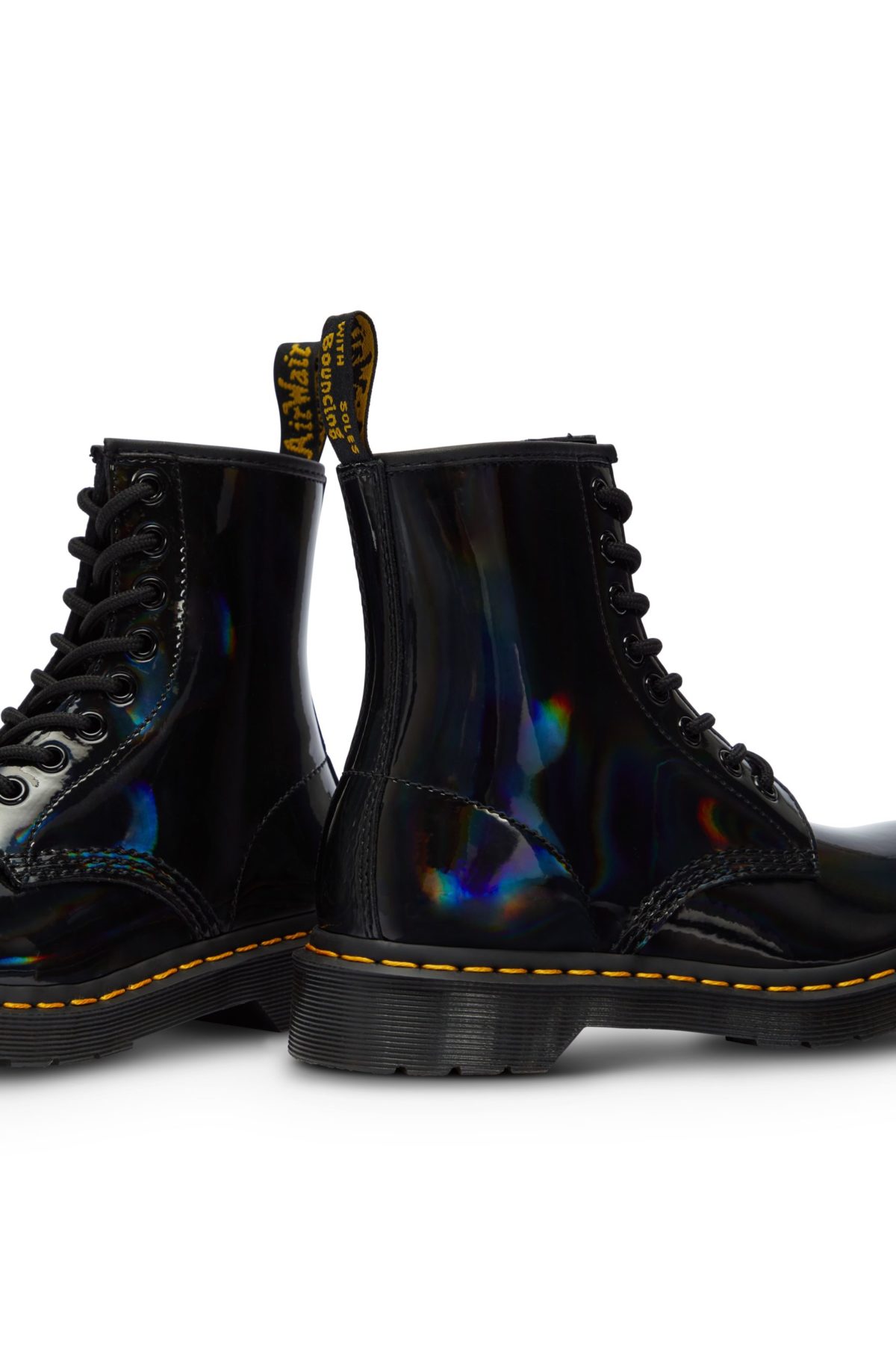 A packshot fashion image showcasing a pair of black boot with a dynamic angle, professionally captured by I Heart Studios.