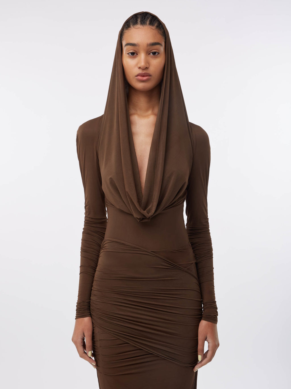 eCommerce body model fashion image by I Heart Studios. A woman wearing a brown dress covering her head.