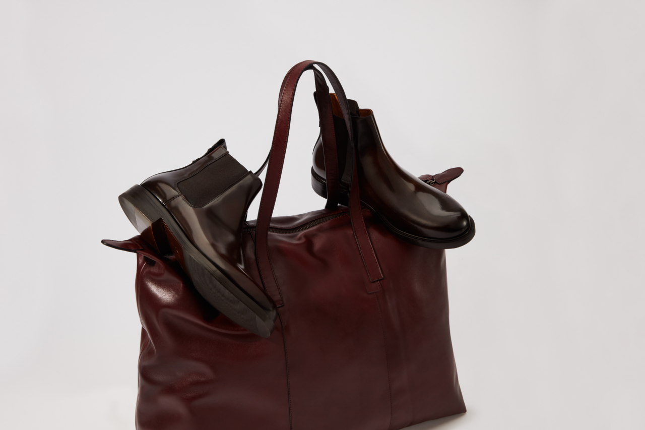 An elevated eCommerce handbag and shoe product image captured by I Heart Studios.